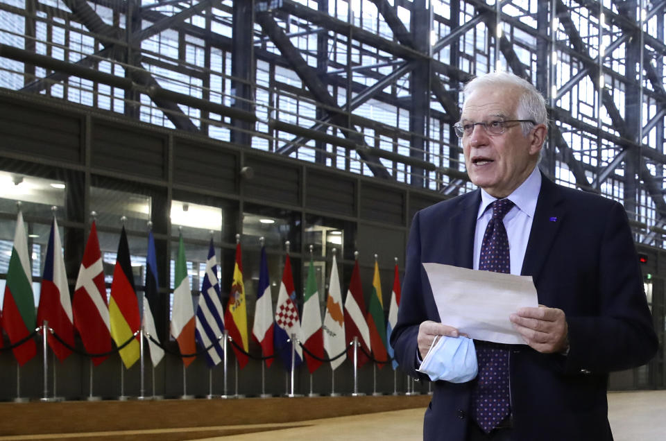 European Union foreign policy chief Josep Borrell speaks to the media as he arrives for a meeting of EU foreign ministers at the European Council building in Brussels, Monday, Feb 22, 2021. European Union foreign ministers on Monday will look at options for imposing fresh sanctions against Russia over the jailing of opposition leader Alexei Navalny as the 27-nation bloc considers the future of its troubled ties with the country. (Yves Herman, Pool via AP)