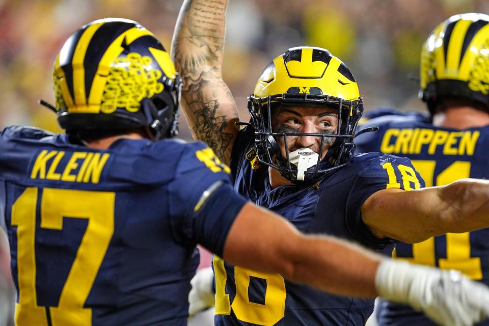 Michigan tight end Colston Loveland celebrates his touchdown catch during last Saturday's season-opening win over Fresno State.