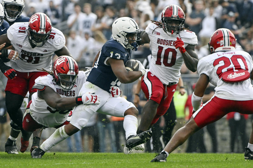 Penn State running back Kaytron Allen (13) rushes against Indiana during the first half of an NCAA college football game, Saturday, Oct. 28, 2023, in State College, Pa. (AP Photo/Barry Reeger)