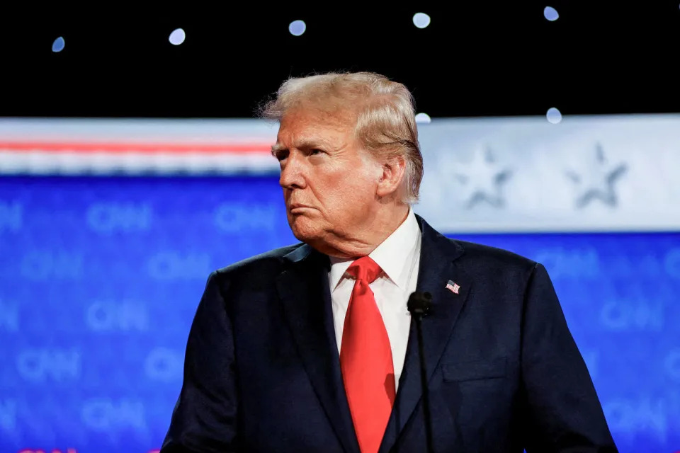 Former President Donald Trump attends the first presidential debate  (Marco Bello / Reuters)