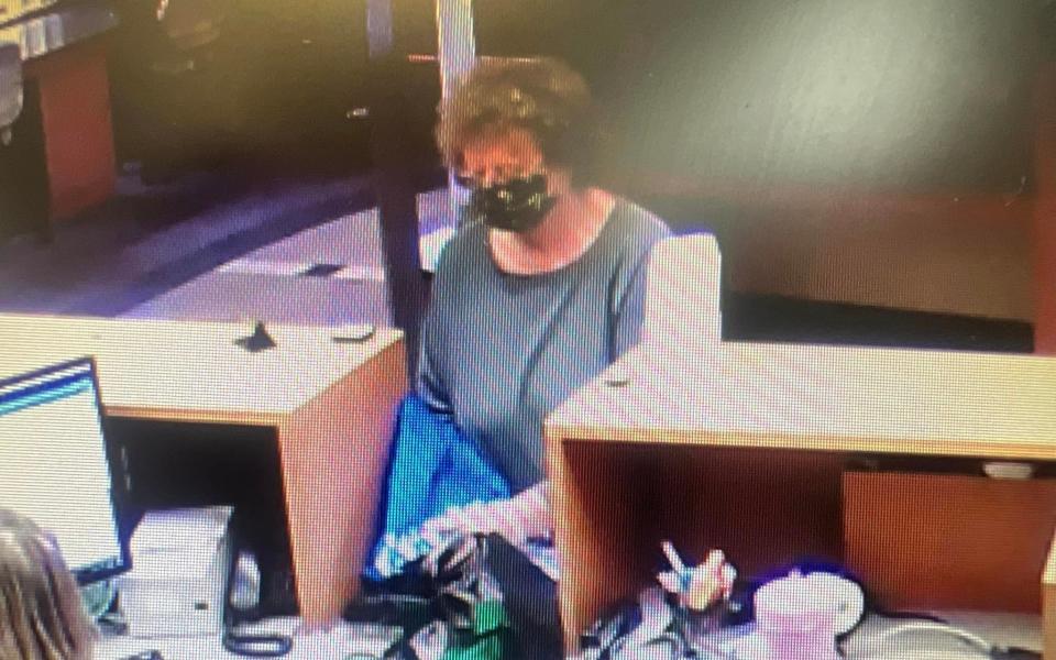 Ann Mayers was filmed on CCTV inside the bank