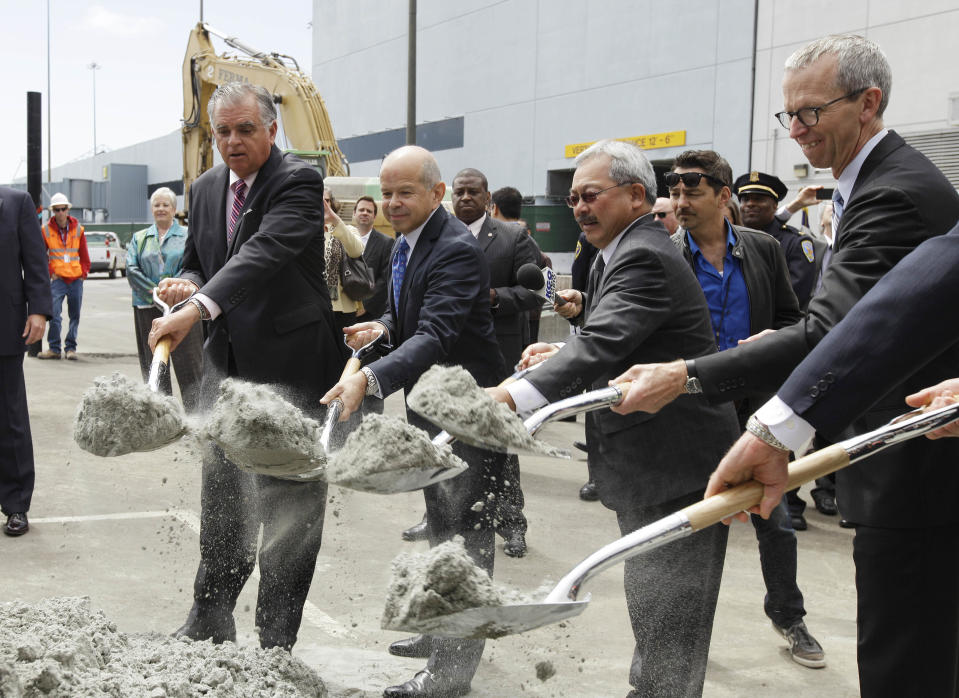 From left, U.S. Transportation Secretary Ray LaHood, Michael Huerta, acting administrator of the FAA, San Francisco Mayor Ed Lee and John Martin, airport director take part in a groundbreaking ceremony for a new traffic control tower at San Francisco International Airport Monday, July 9, 2012 in San Francisco. The airport is getting a new control tower with a unique design that resembles a torch, not the traditional lollipop shape of other towers. The FAA expects to start using the 221-foot tall facility in 2015. (AP Photo/Eric Risberg)