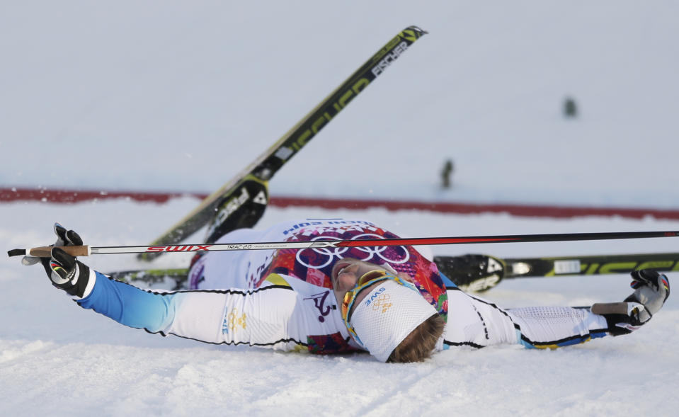 Sweden's Emil Joensson sits in the snow after the men's final of the cross-country sprint at the 2014 Winter Olympics, Tuesday, Feb. 11, 2014, in Krasnaya Polyana, Russia. (AP Photo/Matthias Schrader)