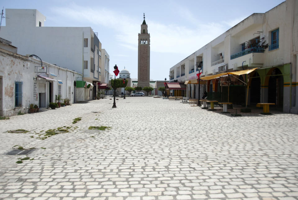 La Marsa district, just outside Tunis, is deserted Monday, May, 10, 2021. Tunisia announced on Friday strict new measures to try to contain the spread of the coronavirus, with the prime minister saying that the health system risks collapsing if something is not done. Houses of prayer are being ordered closed starting Sunday for a week, along with outdoor markets and large stores and malls. Shops selling food can remain open. (AP Photo/Hassene Dridi)