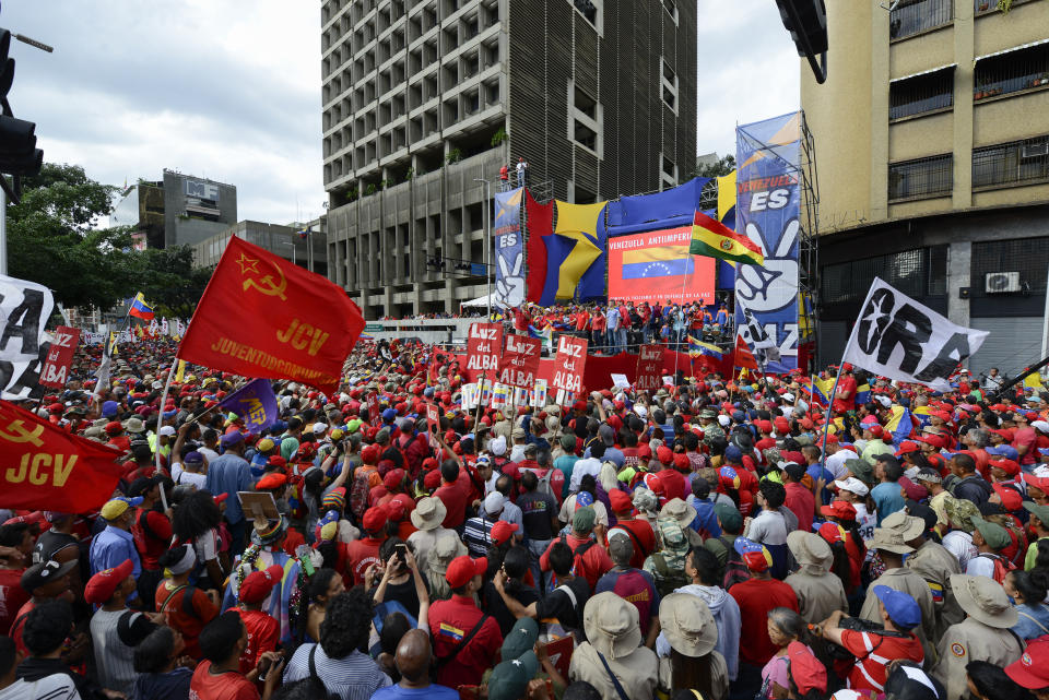 Hundreds gather for a pro-government rally in Caracas, Venezuela, Saturday, Nov. 16, 2019. Nicolas Maduro’s socialist party called its members to demonstrate in solidarity with Bolivia’s Evo Morales, who resigned the presidency and fled into exile in Mexico on Nov. 10, claiming a coup d’etat following massive protests accusing him of engineering a fraudulent reelection. (AP Photo/Matias Delacroix)