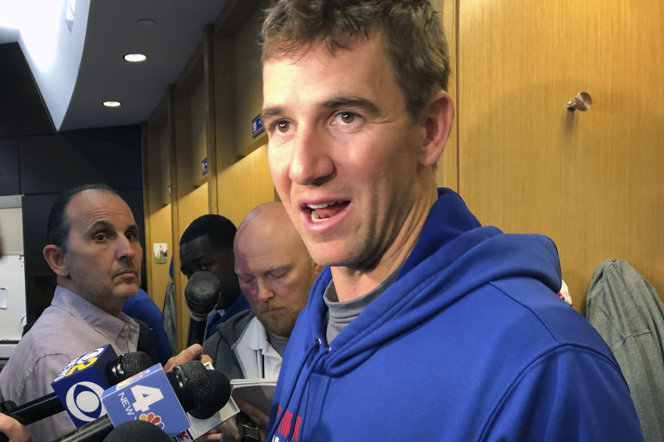 New York Giants quarterback Eli Manning speaks to the media after an NFL football practice in East Rutherford, N.J., Wednesday, Dec. 11, 2019. (AP Photo/Tom Canavan)