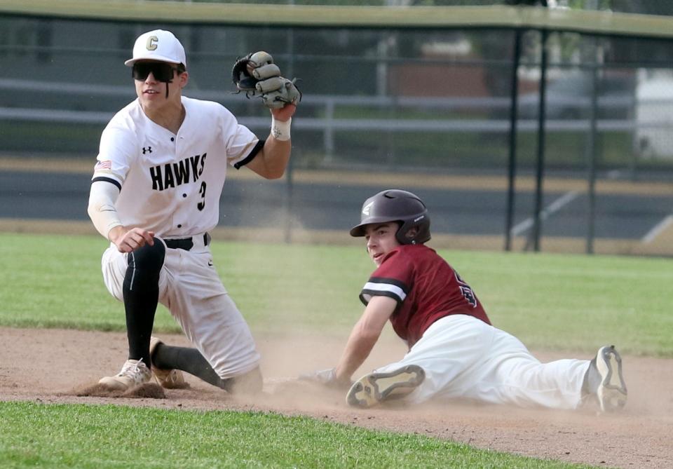 Elmira's Alex Mosher is tagged out at second by Corning's Henry Jackson during the Express' 5-4 win in a Section 4 Class AA baseball semifinal May 20, 2022 at Corning-Painted Post High School.