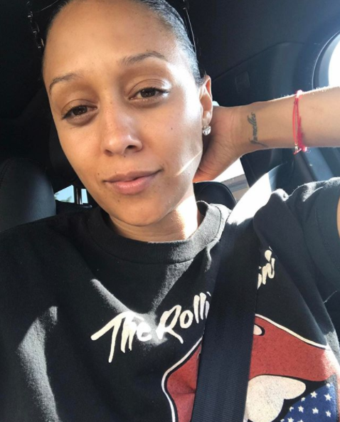 <p>The working mom is down for anything with her hair pulled back. (Photo: Instagram/tiamowry) </p>