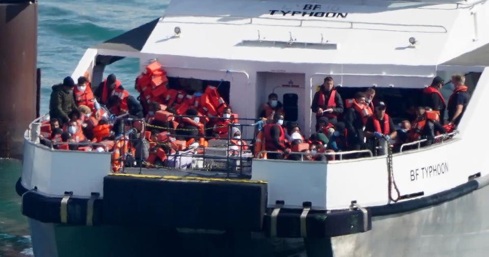 A group of people thought to be migrants are brought in to Dover, Kent, onboard a Border Force vessel (Gareth Fuller/PA) (PA Wire)