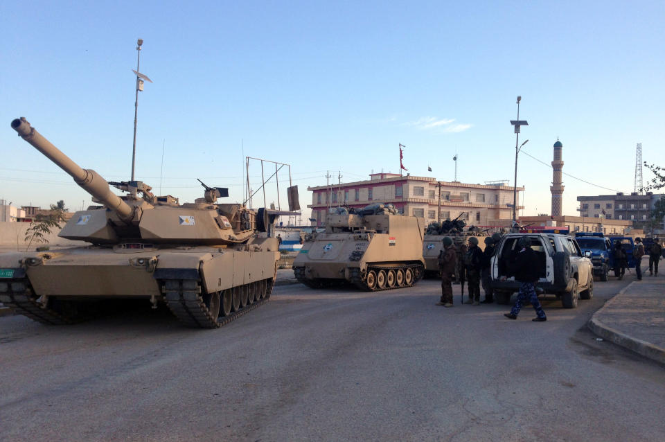 In this picture taken on Saturday, Feb. 1, 2014, Iraqi Security forces patrol in Ramadi, 70 miles (115 kilometers) west of Baghdad, Iraq. Al-Qaida-linked fighters and their allies seized control of the city of Fallujah and parts of the Anbar provincial capital Ramadi last month after authorities dismantled a protest camp by Sunnis angry at what they consider second-class treatment by the Shiite-led government. The government and its tribal allies are besieging the rebel-held areas, with fighting reported daily. (AP Photo)