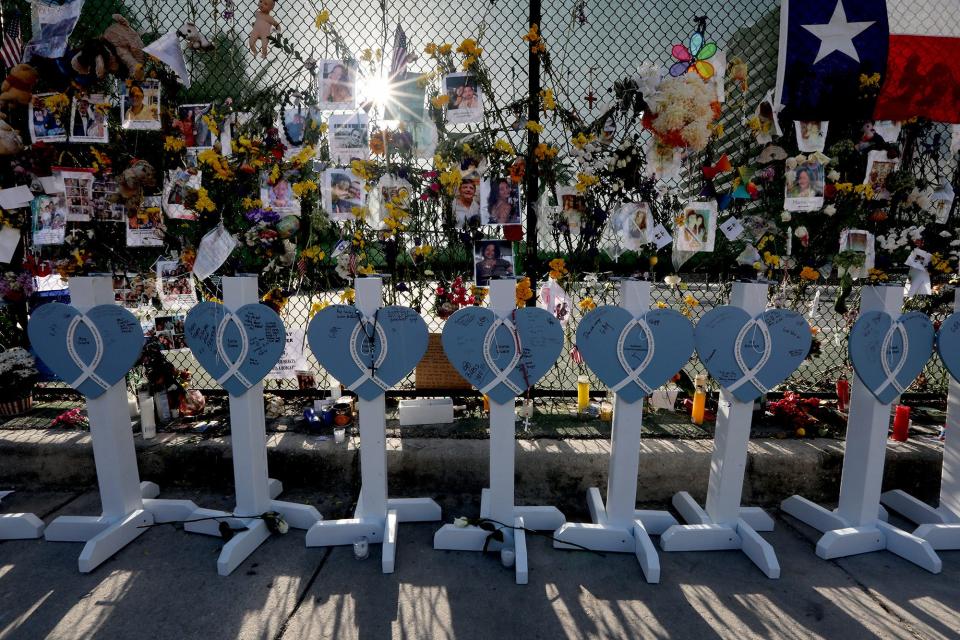 A collection of wooden hearts with the names of some of those who were lost in the Champlain Towers South condo collapse in Surfside Fla., photographed July 8, 2021.The hearts have been placed at the memorial wall dedicated to those lost.