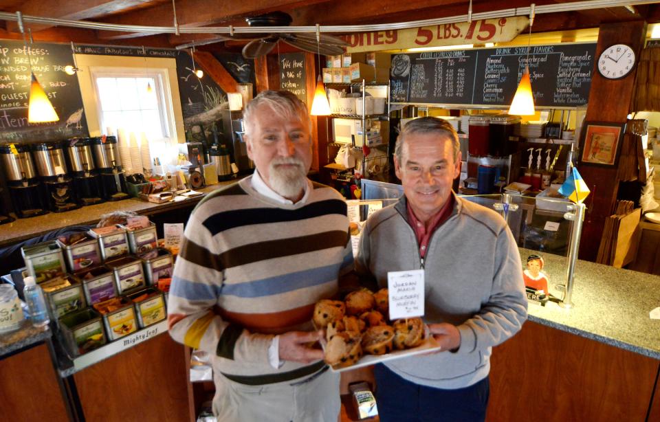 Café Chew owners Tobin Wirt, left, and Robert King are selling their Sandwich business, and they plan to retire. The couple also owned Marshland and Bee Hive Tavern. "It's the interaction with people we will miss the most," Wirt said.