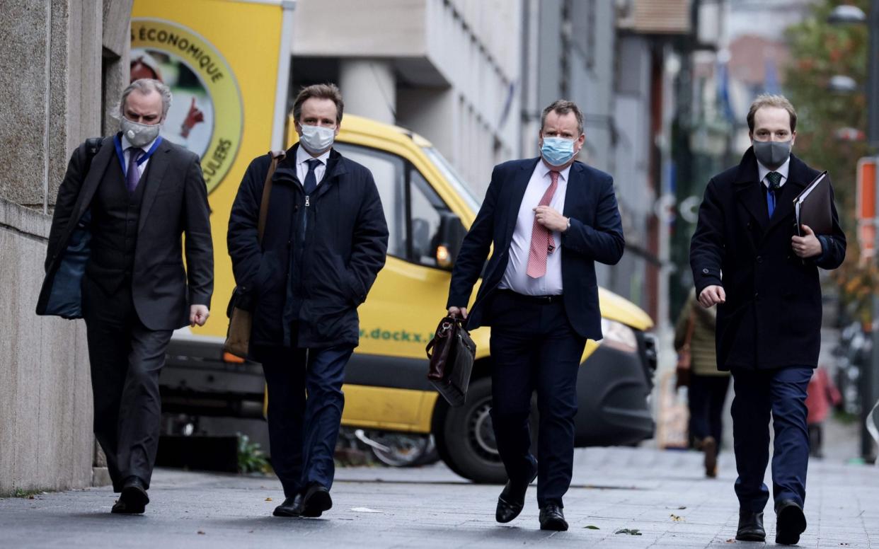 UK chief negotiator David Frost (second right) arrives for negotiations in Brussels yesterday.