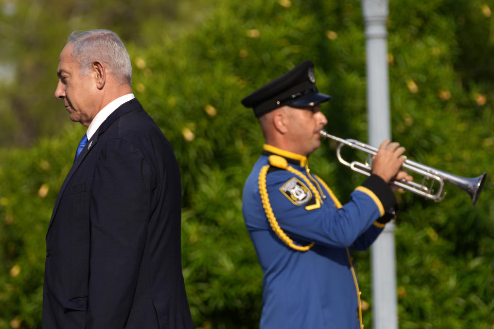 Israeli Prime Minister Benjamin Netanyahu reviews a military guard of honor before a meeting with Cypriot president Nikos Christodoulides at the presidential palace in the capital Nicosia, Cyprus, on Sunday, Sept. 3, 2023. An official statement said Christodoulides and Netanyahu will touch on expanding energy cooperation and bilateral ties, as well as Israel's relations with the European Union. The leaders' meeting comes a day ahead of a trilateral meeting that will include Greek Prime Minister Kyriakos Mitsotakis. (AP Photo/Petros Karadjias)