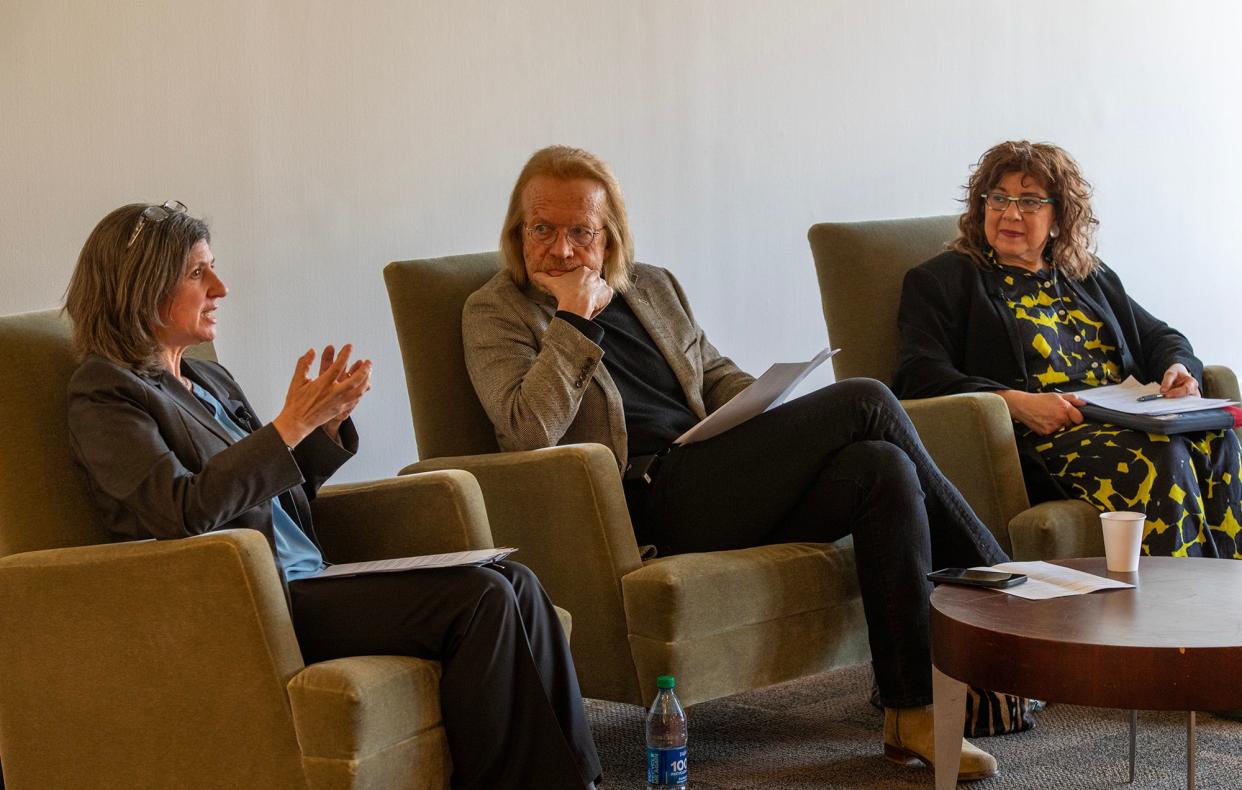 From left, Lisa Leff, Thomas Kühne, and Susannah Heschel, talk during a forum on antisemitism, held March 25 at Clark University.