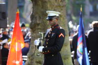 <p>A Marine awaits to play “Taps”at a ceremony in Madison Square Park before the Veterans Day parade in New York City on Nov. 11, 2017. (Photo: Gordon Donovan/Yahoo News) </p>