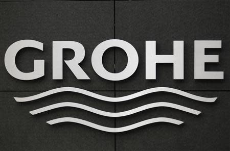 The logo of Grohe, Europe's biggest bathroom installations maker, is displayed at the entrance of their headquarters in Duesseldorf September 26, 2013. REUTERS/Ina Fassbender