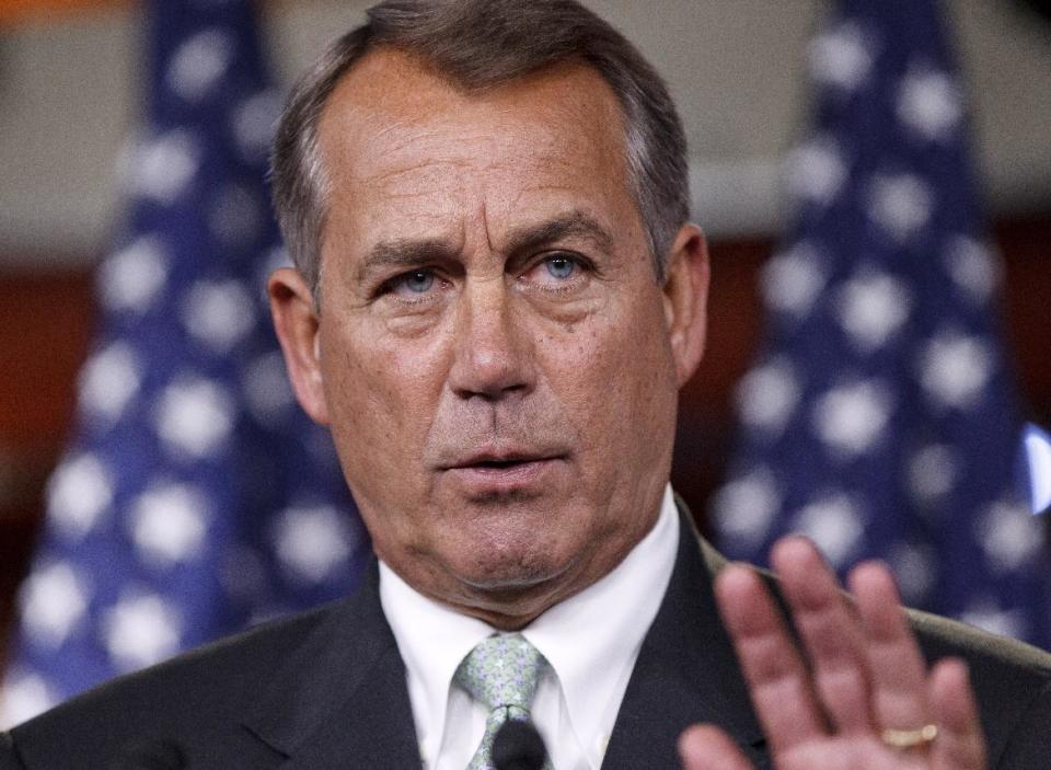 FILE - In this March 1, 2012 file photo, House Speaker John Boehner of Ohio gestures during a news conference on Capitol Hill in Washington. House Republicans follow up their frugal _ but nonbinding _ tea party budget with less stringent cuts. Instead of promised slashes to Medicaid and food stamps, top GOP lawmakers are thinking smaller. And they're even reaching out to Democrats to help pass annual spending bills. (AP Photo/J. Scott Applewhite, File)