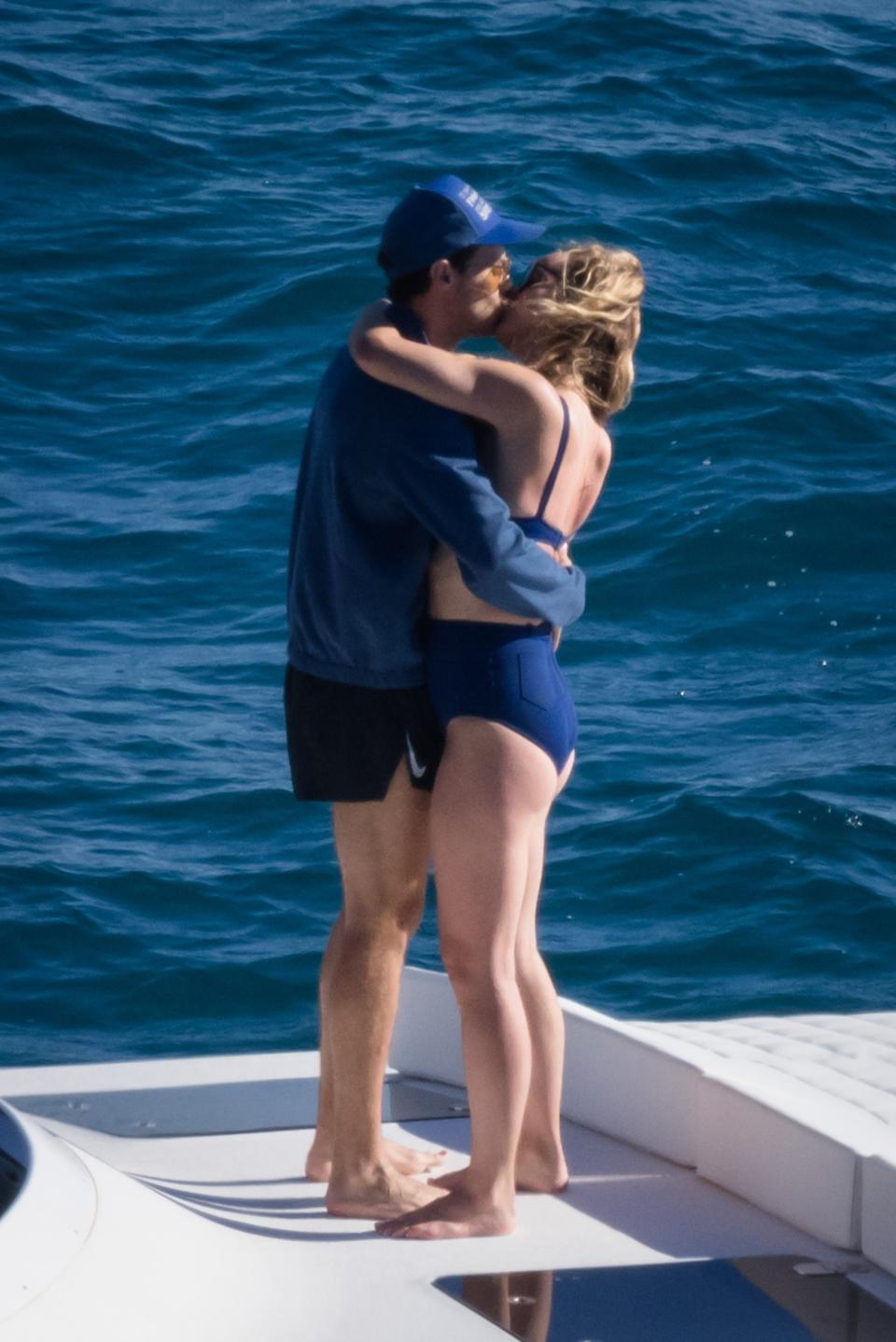 Harry Styles and Olivia Wilde soak up the Tuscany sun and enjoy a PDA-filled afternoon on a yacht in Argentario while out enjoying a romantic vacation together