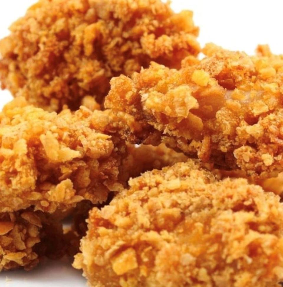 Qcrew BBQ Catering Co.’s Cap'n Crunch chicken tenders are coated in dusted Cap'n Crunch cereal, then fried and served at room temperature with homemade honey mustard.