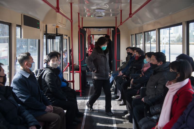 Commuters in face masks on a tram in Pyongyang, North Korea, in March (Picture: Getty Images)