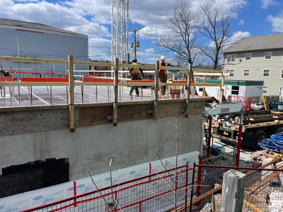 Construction crews have laid a foundation for what will be an affordable apartment complex operated by the non-profit group Affirmative Ventures.