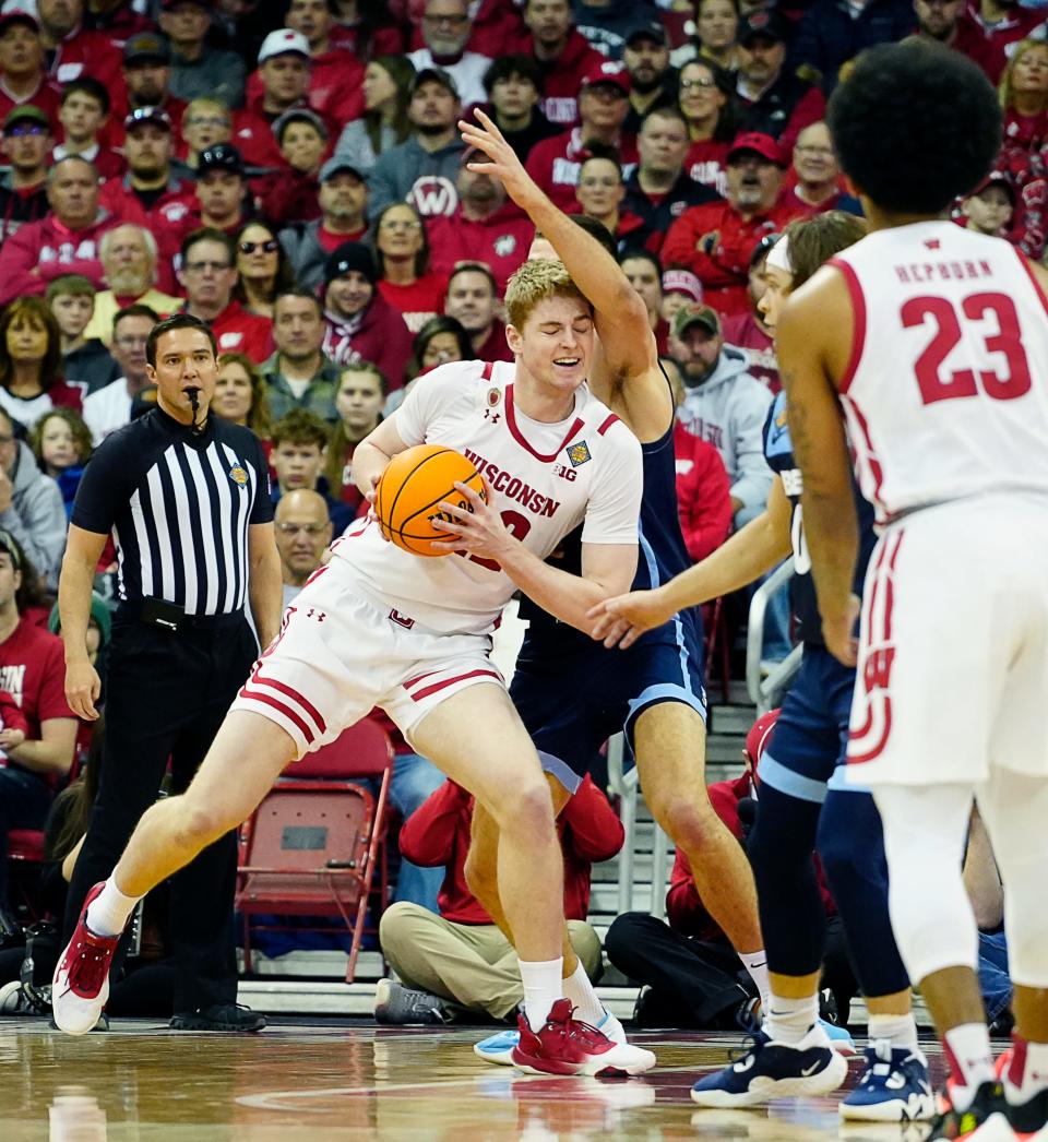 Wisconsin forward Steven Crowl drives to the basket during the first half of the Badgers' game against Liberty in the second round of the National Invitation Tournament on Sunday at the Kohl Center. Crowl has scored 50 points in two NIT games.