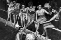 <p>A young Ronald Reagan poses with six other actors aboard the SS America in 1940. </p>