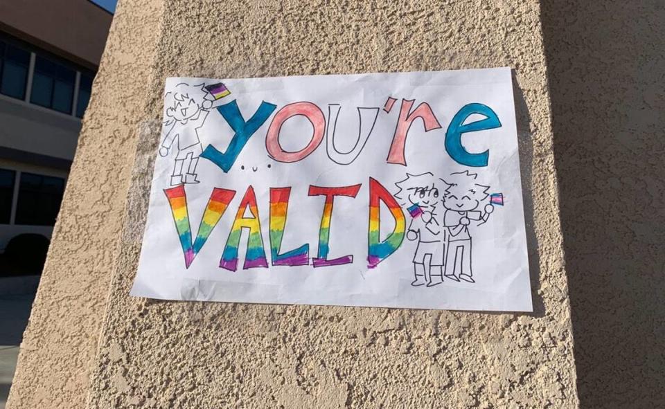 Students at Paso Robles High School created signs promoting love and inclusion after an incident in which an LGBTQ Pride flag was stolen from a classroom and defecated on. Following the incident, the district changed its policy to limit the size of flag displays.