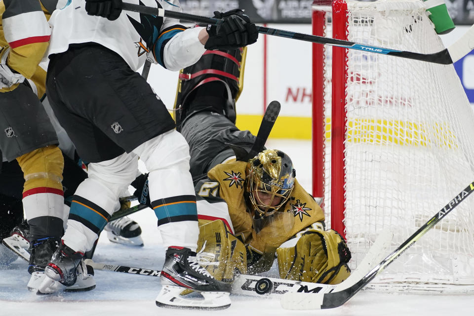 Vegas Golden Knights goaltender Marc-Andre Fleury (29) makes a save against the San Jose Sharks during the third period of an NHL hockey game Wednesday, April 21, 2021, in Las Vegas. (AP Photo/John Locher)