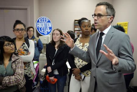 Jeffrey Hons (R), President and CEO of Planned Parenthood South Texas, speaks during a media tour of the Whole Woman's Health clinic in San Antonio, Texas, February 9, 2016. REUTERS/Darren Abate