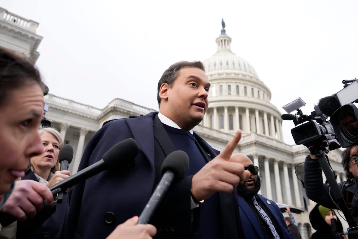 George Santos leaves the US Capitol after being expelled on 1 December (Getty)