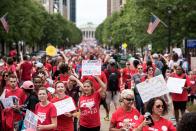 <p>Protesters gather in the streets during a North Carolina public school teacher march and rally in Raleigh, N.C., May 16, 2018. The teachers are asking for high salaries and more school funding from the North Carolina legislature. (Photo: Caitlin Penna/EPA-EFE/REX/Shutterstock) </p>