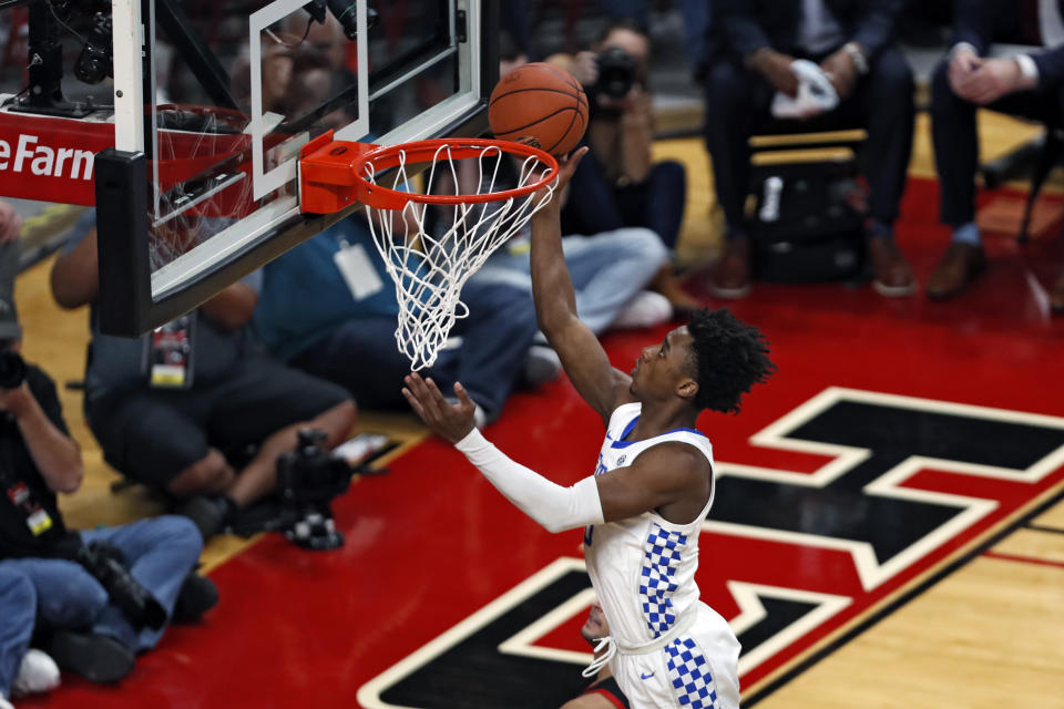 Kentucky's Ashton Hagans (0) lays the ball up during the first half of an NCAA college basketball game against Texas Tech, Saturday, Jan. 25, 2020, in Lubbock, Texas. (AP Photo/Brad Tollefson)