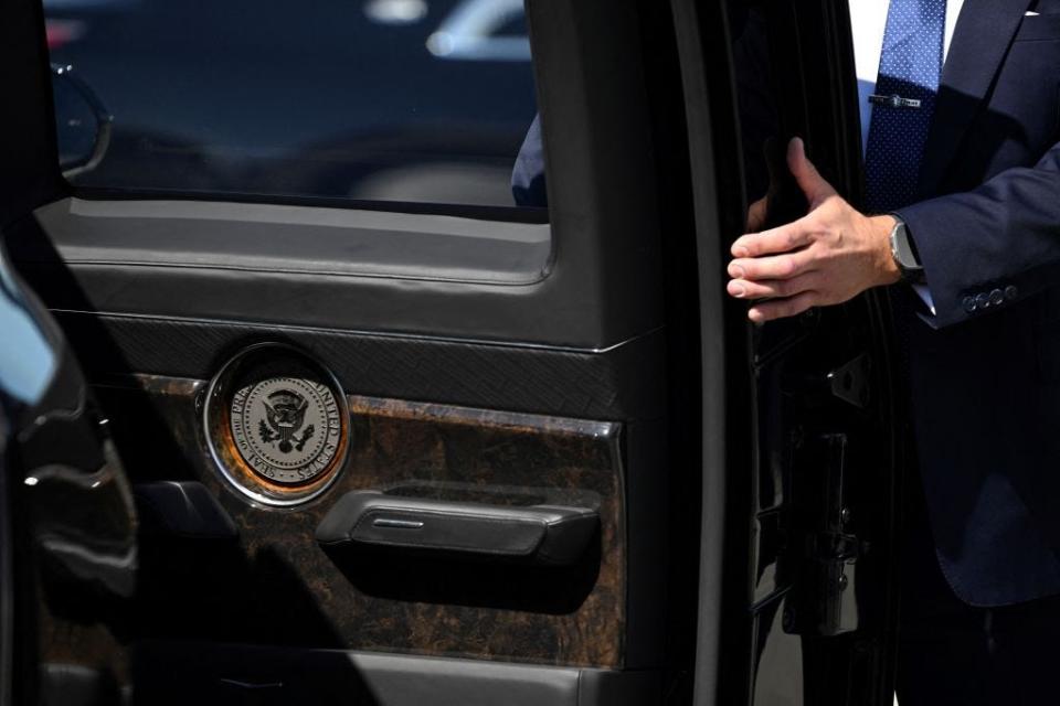 The presidential seal is seen inside the door of US President Joe Biden's limousine