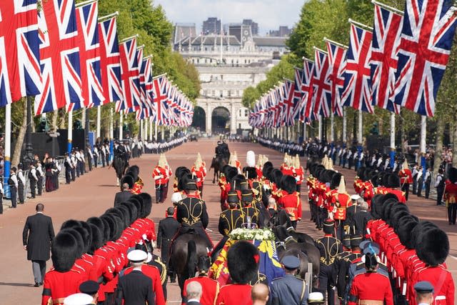 The ceremonial procession from Buckingham Palace 