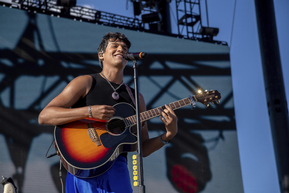 FILE - Omar Apollo performs at the Coachella Music & Arts Festival at the Empire Polo Club on Friday, April 22, 2022, in Indio, Calif. On his latest EP, “Live For Me,” Omar Apollo processes death, grief, acceptance and the lack of it — big, traumatic emotions — through intimate, lush sounds. (Photo by Amy Harris/Invision/AP, File)