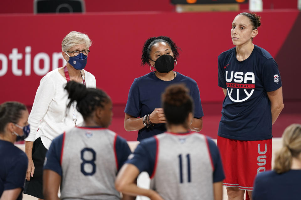 United States head coach Dawn Staley, center, talks to her team during a women's basketball practice at the 2020 Summer Olympics, Saturday, July 24, 2021, in Saitama, Japan. (AP Photo/Charlie Neibergall)