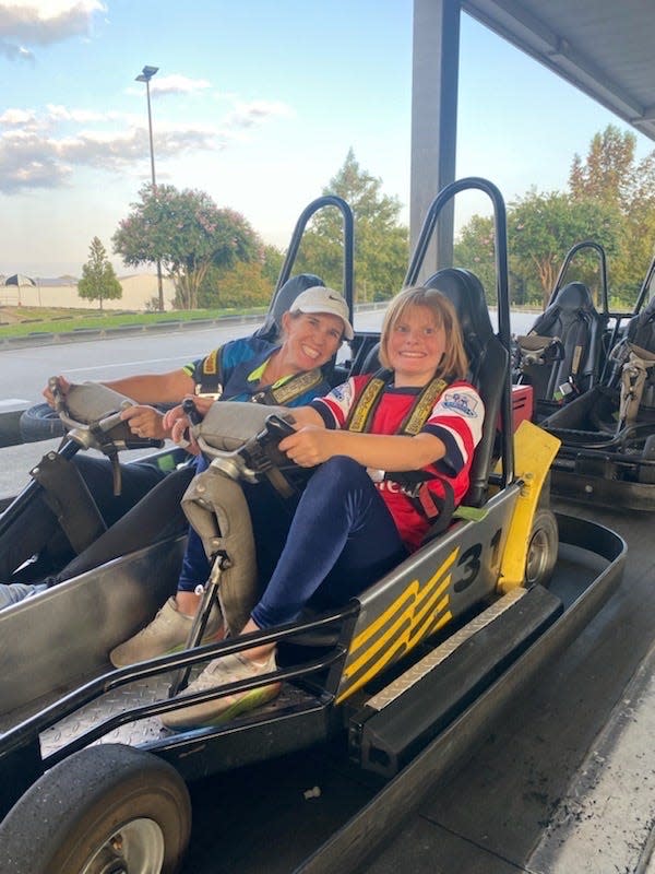 Greenville Special Olympics Golf and Pickleball Coach Sandy Halkett is pictured having fun with students from her teams.