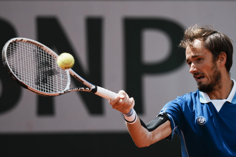 Russia's Daniil Medvedev plays a shot against Serbia's Miomir Kecmanovic during their third round match at the French Open tennis tournament in Roland Garros stadium in Paris, France, Saturday, May 28, 2022. (AP Photo/Thibault Camus)