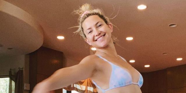 Kate Hudson, 41, looks half her age as she flashes a toned tummy