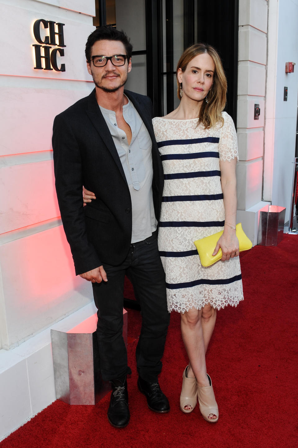 Pedro Pascal, Sarah Paulson, Vanity Fair, Carolina Herrera, leather boots, denim, red carpet, blazer