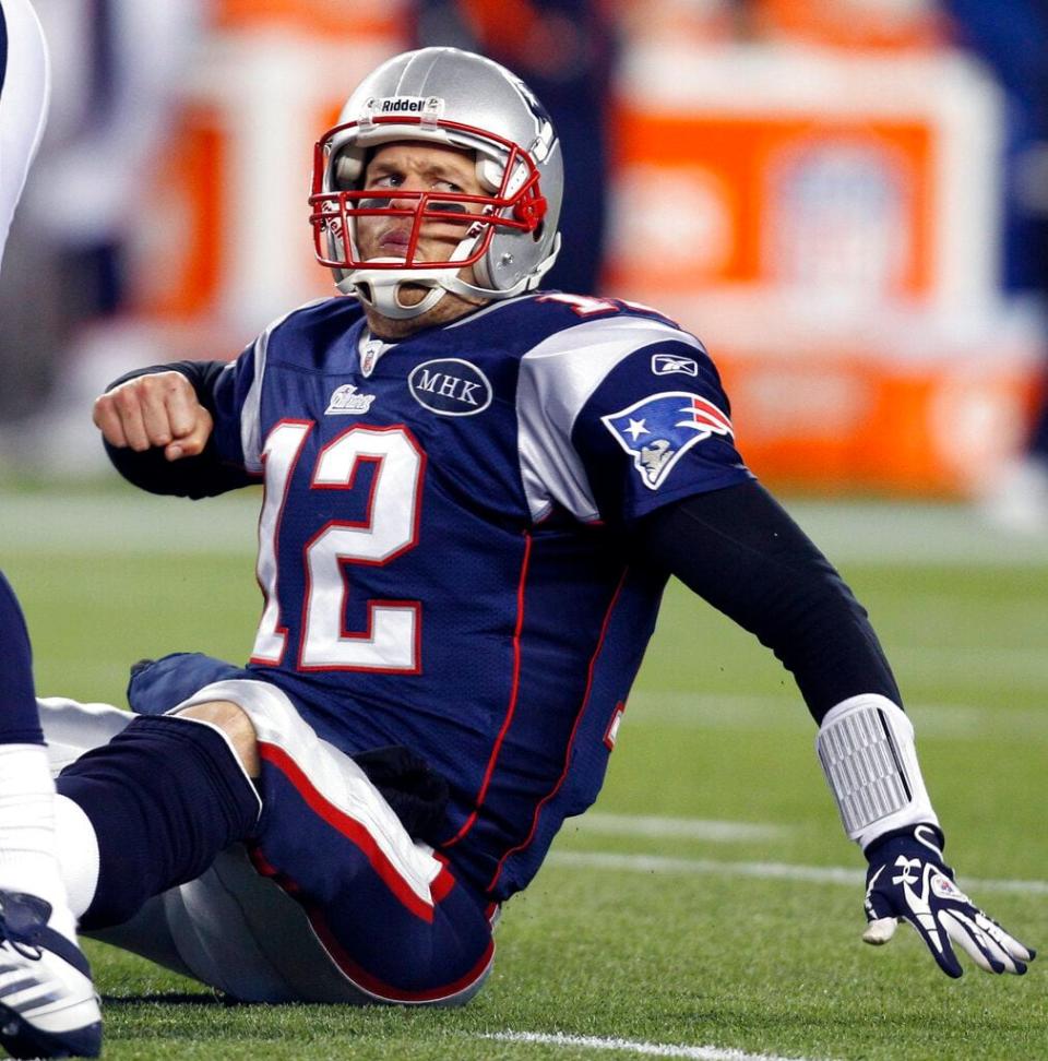 FILE - In this Jan. 14, 2012, file photo, New England Patriots quarterback Tom Brady celebrates his 19-yard touchdown pass to Rob Gronkowski during the first half of an NFL divisional playoff football game against the Denver Broncos in Foxborough, Mass. Brady had one of his most prolific playoff games at home on Jan. 14, 2012, when he and the Patriots ended Tebow Mania. (AP Photo/Elise Amendola, File)