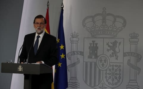 Spain's Prime Minister Mariano Rajoy delivers a statement at the Moncloa Palace in Madrid - Credit: Sergio Perez/Reuters