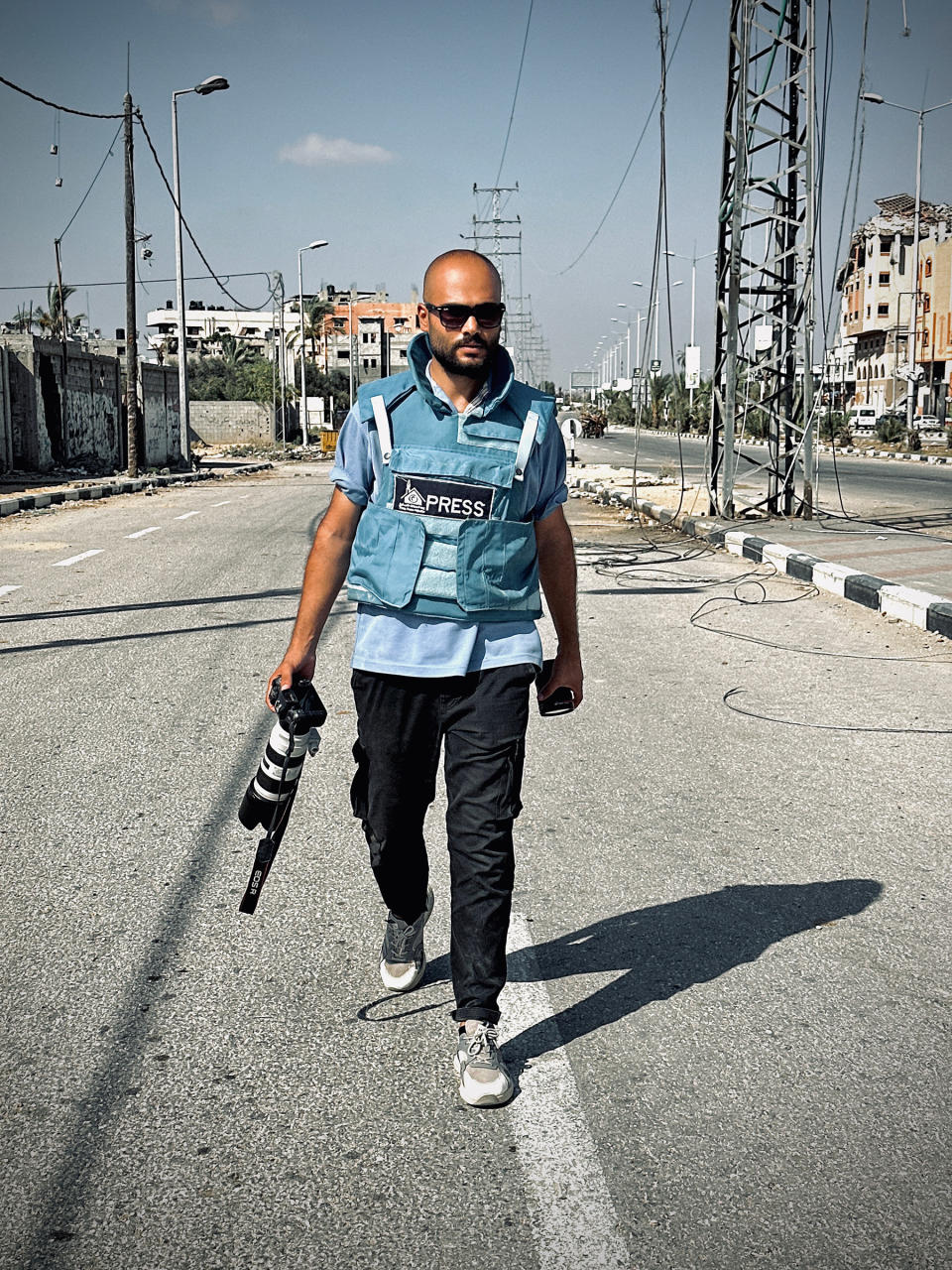 Photojournalist Saher Alghorra while working on the Netzarim corridor.<span class="copyright">Courtesy Saher Alghorra</span>