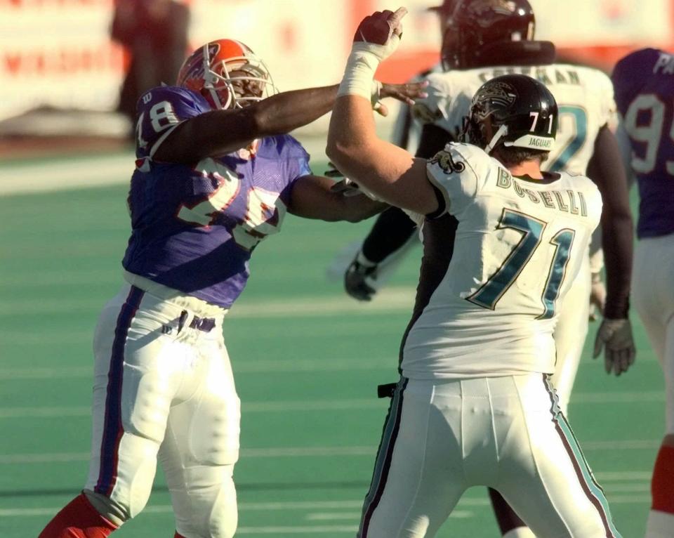 Buffalo Bills DE Bruce Smith and Jacksonville Jaguars OT Tony Boselli (71) shove each other after a play during a 1997 game.