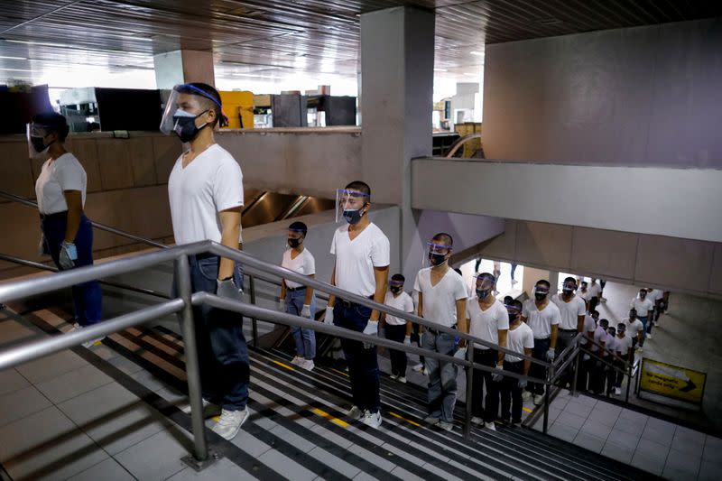 Philippines' police test runs new social distancing rules on public trains in the capital