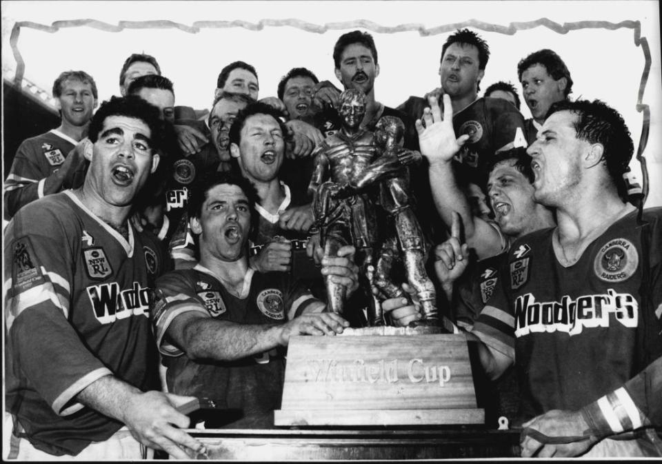 Canberra celebrating the 1989 Grand Final victory. (Photo by Paul Matthews; Craig Golding; Quentin Jones; Steve Christo/Fairfax Media via Getty Images).