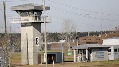 A watch tower on the grounds of the Central Mississippi Correctional Facility in Pearl, Miss. The state’s habitual offender laws disproportionately affect African American men and cost the state millions of dollars for decades of incarceration. (AP Photo/Rogelio V. Solis)