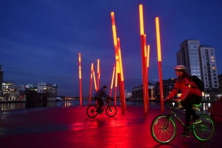 Cyclists ride dublinbikes in Dublin's docklands area, Ireland February 17, 2016. REUTERS/Clodagh Kilcoyne